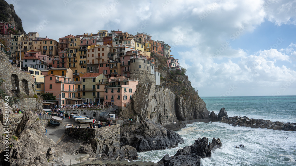 Manarola, Italy during a summer rain. Manarola is built on a high rock 70 metres above sea level, is one of the most charming and romantic of the Cinque Terre villages.