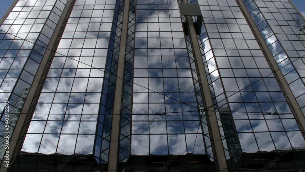 Clouds reflection on Canada Building
Clouds move and are reflected on a glass building in Toronto Ontario Canada
