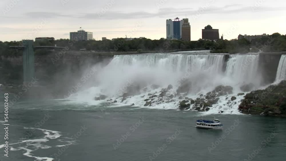 Niagara Falls and a tourist boat passing below in Ontario Canada
Aerial view from Niagara Falls Ontario Canada, 2021
Niagara Falls and a tourist boat passing below in Ontario Canada
Aerial view from Niagara Falls Ontario Canada, 2021