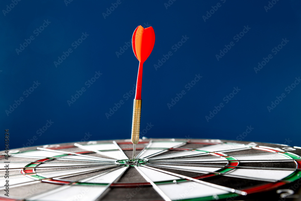 Dart hitting on center target Dart hitting on center target