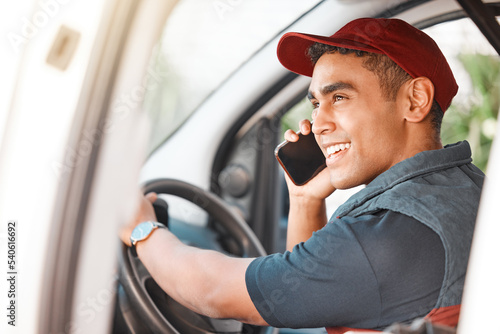 Phone call, delivery and courier talking on a mobile, working and driving for ecommerce business in a car. Young, happy and thinking logistics driver speaking about cargo on a smartphone in a van