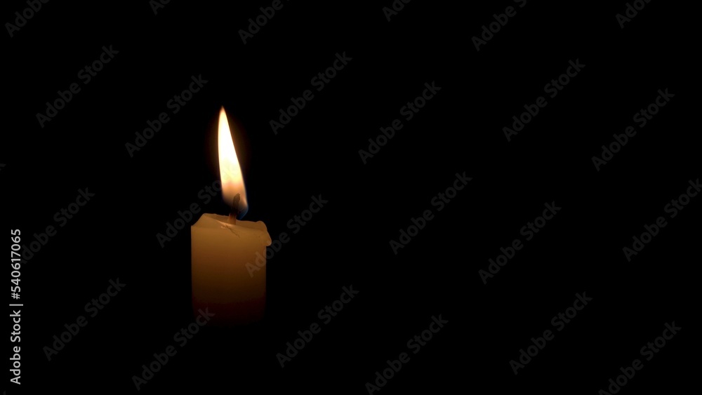 A Candle Burns with a Bright Flame on a Black Background. The Flame of a Wax Candle Glows Mysteriously in the Darkness. Illustration of Remembrance, Celebration or Religious Ceremony A Candle Burns with a Bright Flame on a Black Background. The Flame of a Wax Candle Glows Mysteriously in the Darkness. Illustration of Remembrance, Celebration or Religious Ceremony