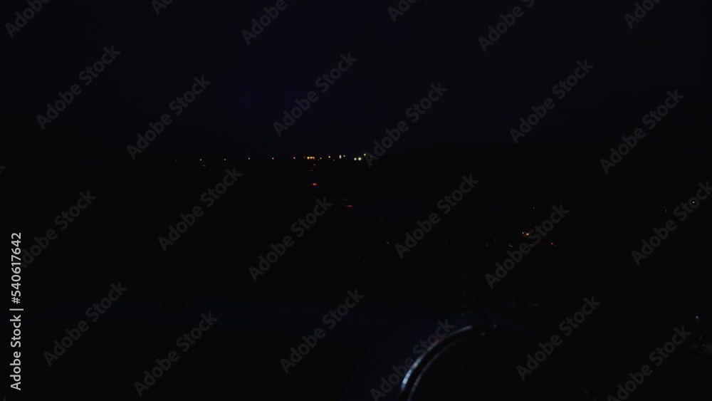 Red and blue flashing light on the roof of a police patrol car in the