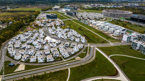 a panoramic view from a drone of buildings and architectural and landscape solutions against the backdrop of autumn colors in Skolkovo