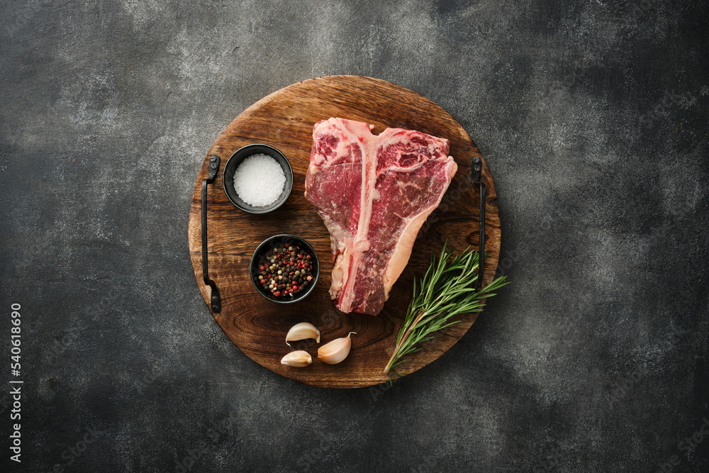 Tbone or porterhouse raw steak of beef cut from the short loin. Steak include Tshaped bone