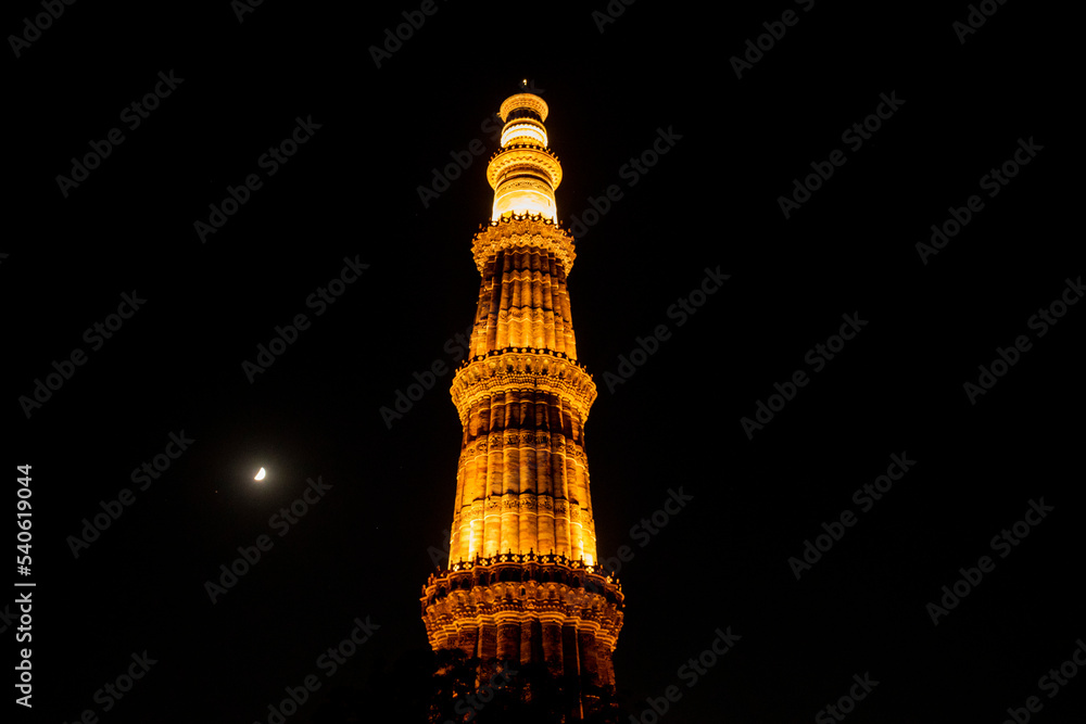 Qutub minar at night with lights