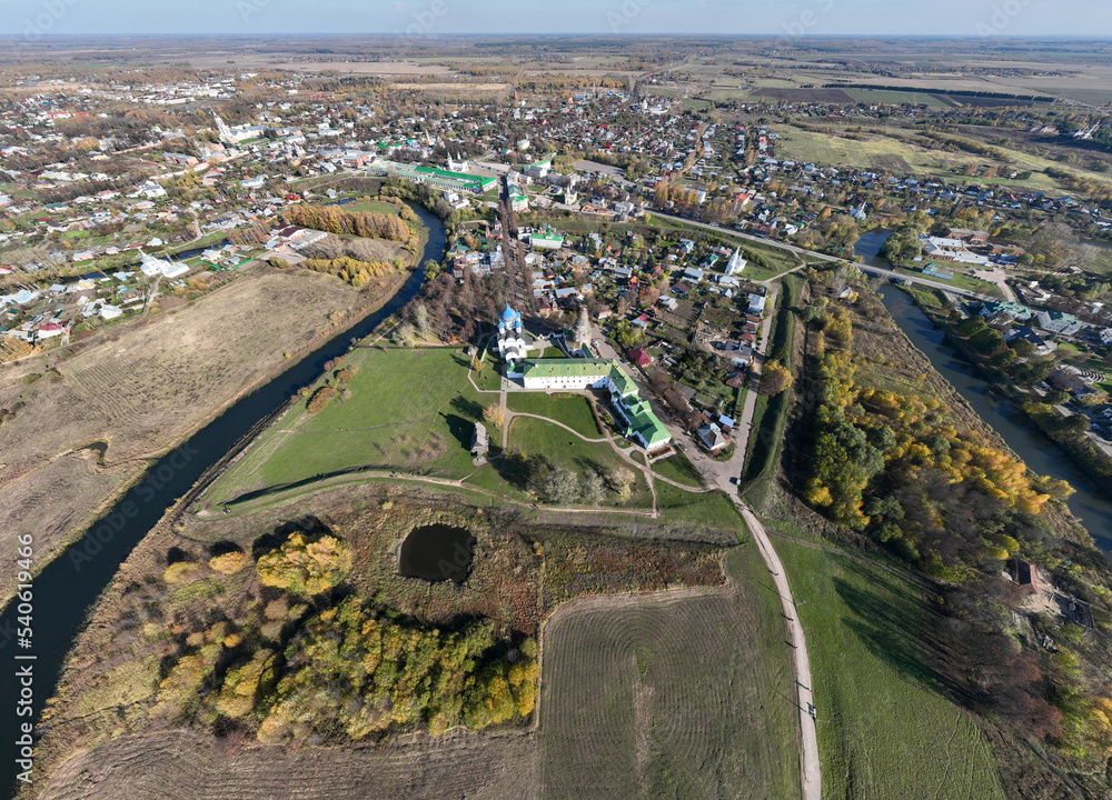 panoramic view from a drone of the old church and its surroundings on a gray autumn day