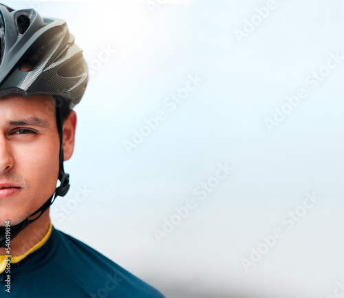 Man, face and bike helmet in training, workout and exercise on mockup space in Canada with cycling motivation, goals or health target. Portrait, sports cyclist and fitness athlete with winner mindset © Beaunitta V W/peopleimages.com