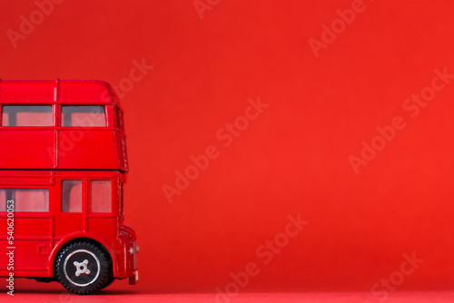 red double-decker tourist bus - symbol of Britain. minimalist travel background photo