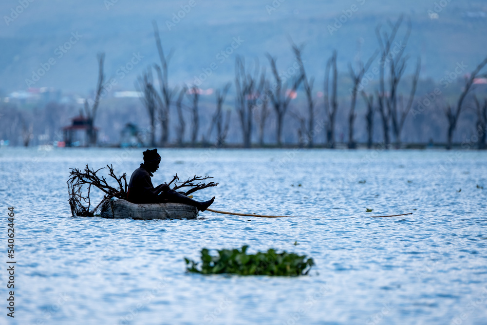 Naklejka premium Fisherman in Lake Naivasha, Kenya