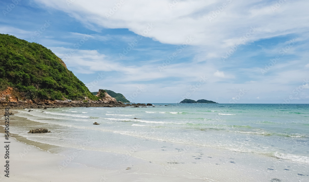 Smooth white sand and clear water at Nam Sai Beach, Sattahip District, Chonburi Province, Thailand. Tropical sea tourism.