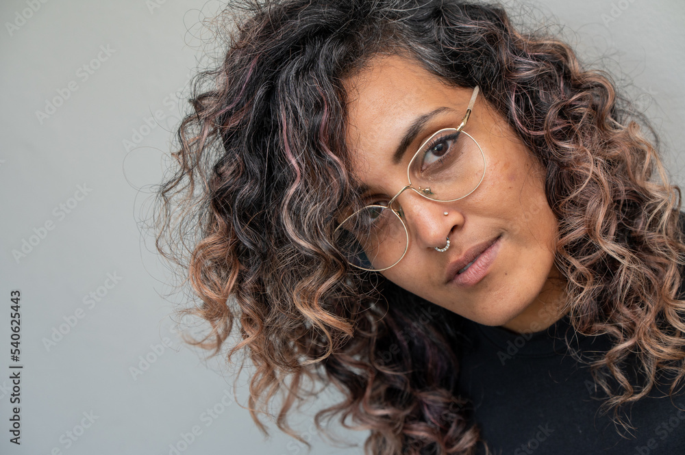 Portrait of woman looking directly into camera Portrait of woman looking directly into camera