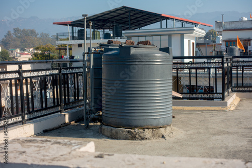 february 12th 2022, Dehradun City India. Big plastic water tanks on a roof top of a building in Urban area.
