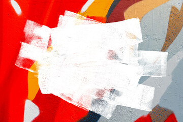Acrylglasbilder Graffiti Closeup of colorful gray, orange, red urban wall texture with white white paint stroke. Modern pattern for design. Creative urban city background. Grunge messy street style background with copy space  © Aleksandra Konoplya