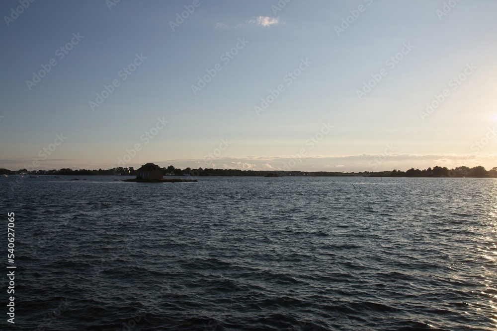 Obraz premium sunset over the river