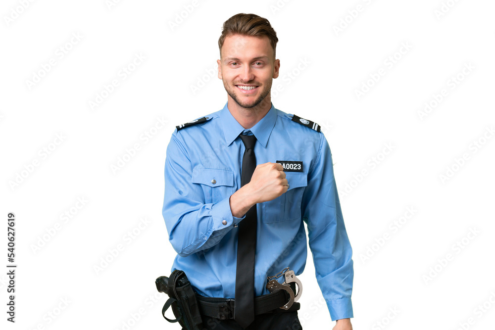 Young police man over isolated background celebrating a victory Young police man over isolated background celebrating a victory