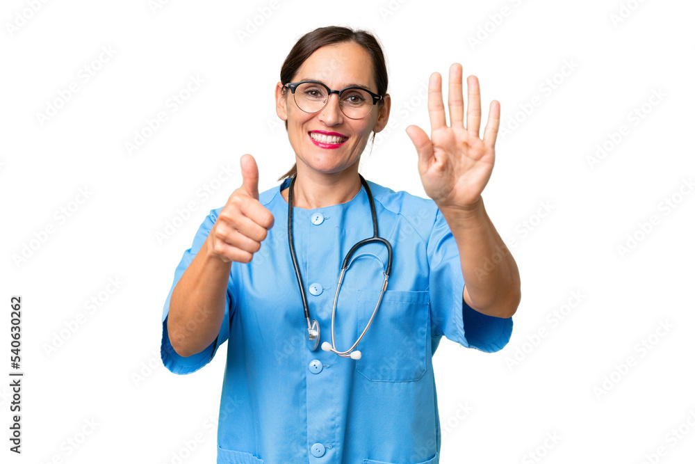 Middle-aged nurse woman over isolated background counting six with fingers Middle-aged nurse woman over isolated background counting six with fingers