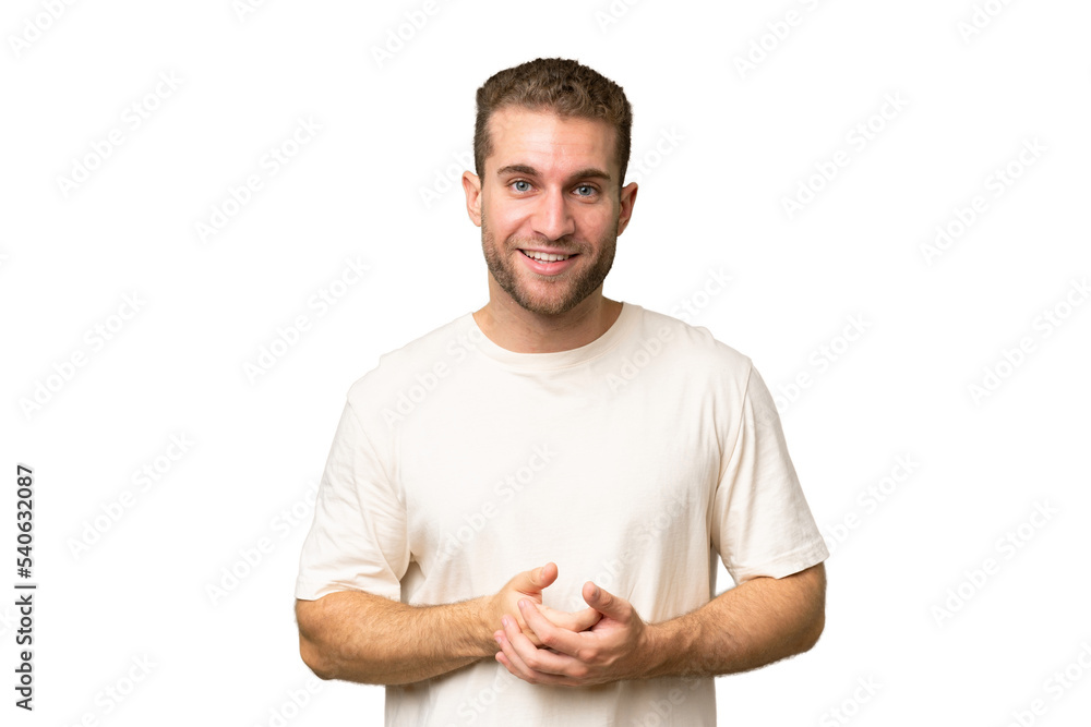 Young handsome caucasian man isolated on green chroma background laughing Young handsome caucasian man isolated on green chroma background laughing