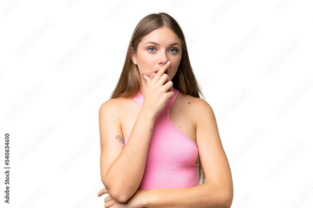 Young beautiful blonde woman over isolated background surprised and shocked while looking right Young beautiful blonde woman over isolated background surprised and shocked while looking right