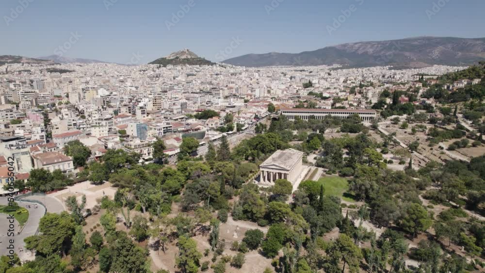 Aerial View Of Temple of Hephaestus With Athens Skyline In Background. Orbit Motion Aerial View Of Temple of Hephaestus With Athens Skyline In Background. Orbit Motion