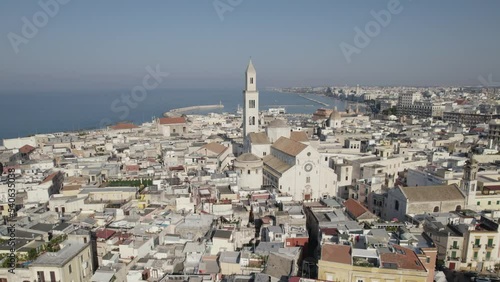 Coastal Picturesque Bari city with beautiful Cathedral of Saint Sabinus, Aerial orbiting view, Italy photo