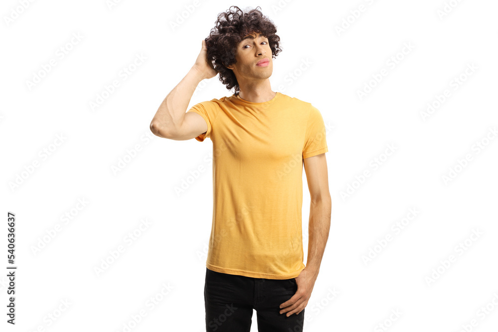 Pensive young man with curly hair thinking and holding head Pensive young man with curly hair thinking and holding head