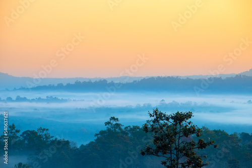 Aerial view sunrise over mountain with fog over the ground in foreground savannah Meadow , Petchaboon province, Thailand,asia. © noon@photo