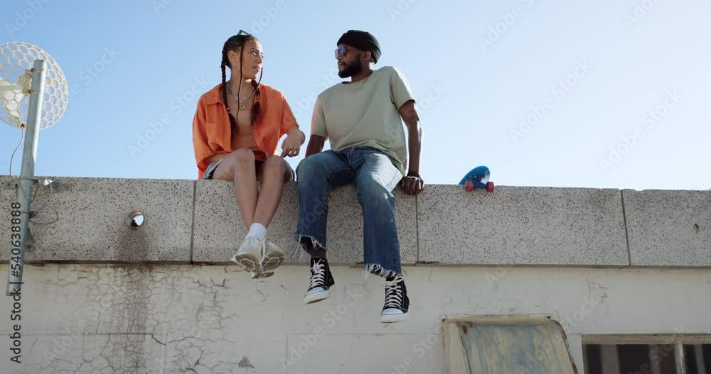 Couple, sitting and roof for talk above building in conversation ...