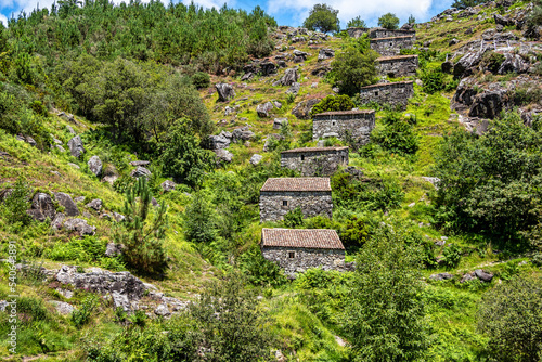 Folon and Picon water mills in Galicia, Spain, are a historical set of about 60 cascading mills photo