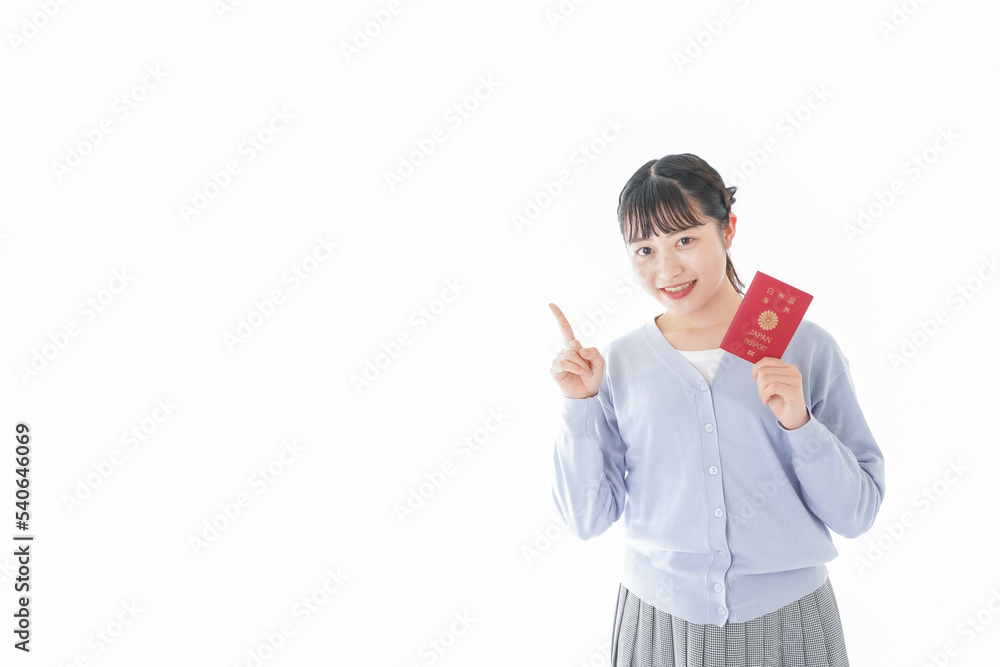 パスポートを持つ若い女性 パスポートを持つ若い女性