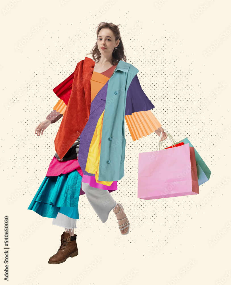 Creative art portrait of fashionable woman wearing a lot of diverse clothes over white background. Beauty, fashion, style, shopping addiction