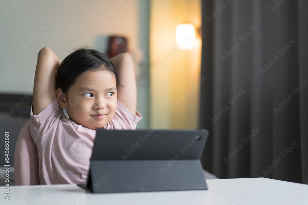 asian child back to school and smile study online class on computer tablet or kid girl student video call studying and new idea thinking learning or person learn from home in classroom at homeschool asian child back to school and smile study online class on computer tablet or kid girl student video call studying and new idea thinking learning or person learn from home in classroom at homeschool