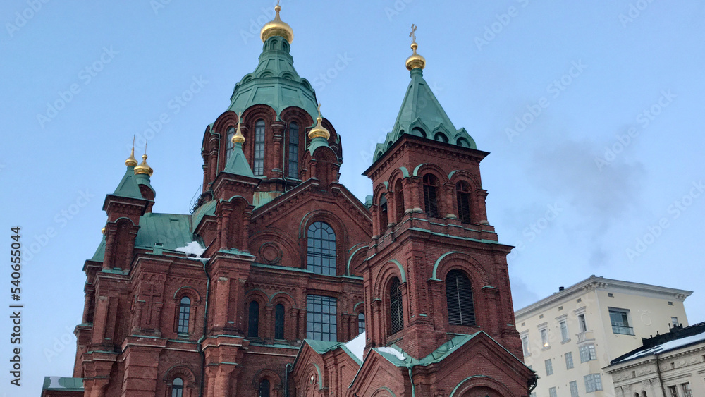 Helsinki, Finland, February 2018 - A church with a clock on the front of a building Helsinki, Finland, February 2018 - A church with a clock on the front of a building