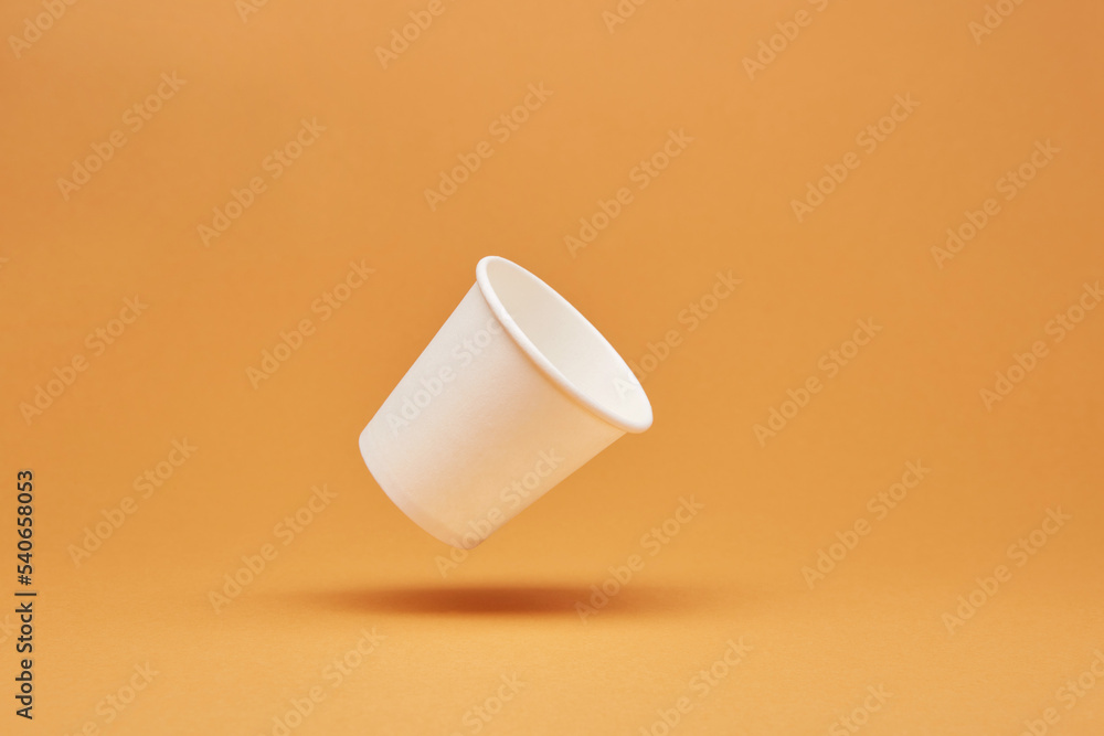 Disposable white single one recyclable cardboard paper cup floating ...
