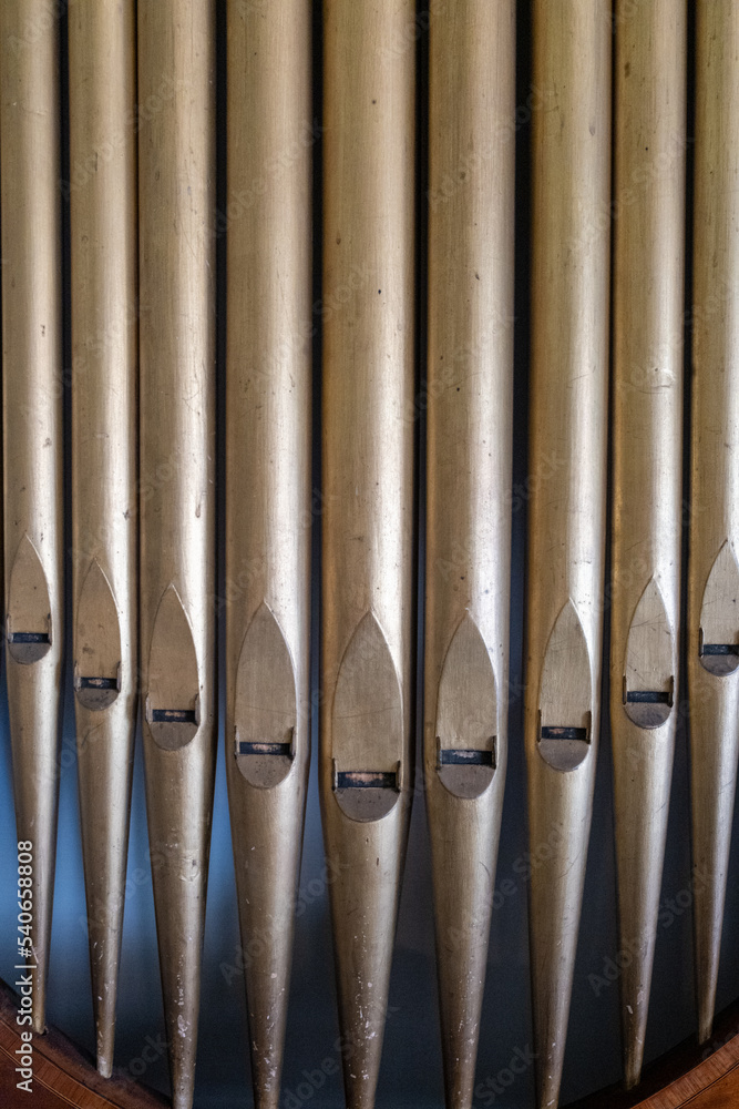 organ pipes in a wooden frame