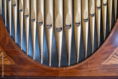 organ pipes in a wooden frame