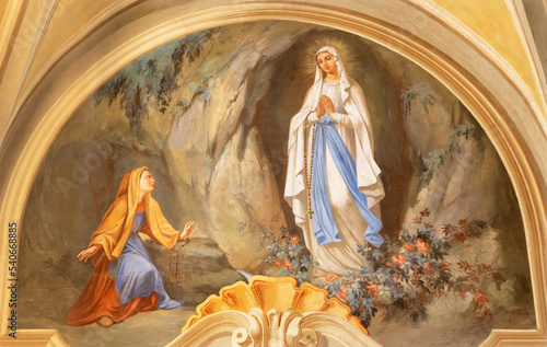 Wallpaper Mural COURMAYEUR, ITALY - JULY 12, 2022: The fresco of apparition of Virgin Mary in Lourdes in church Chiesa di San Pantaleone by Nino Pirlato (1957)