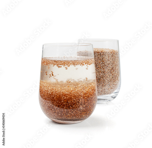 Plantago Ovata Seeds in Glass of Water Isolated, Psyllium Husk, Isabgol Ispaghula photo