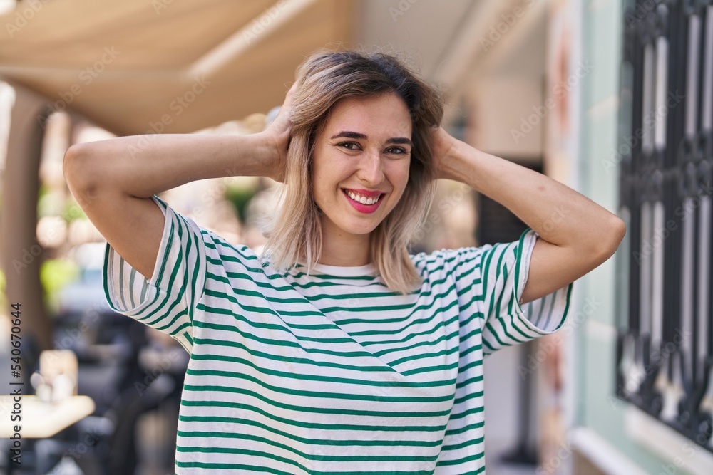 Young woman smiling confident standing at street Young woman smiling confident standing at street