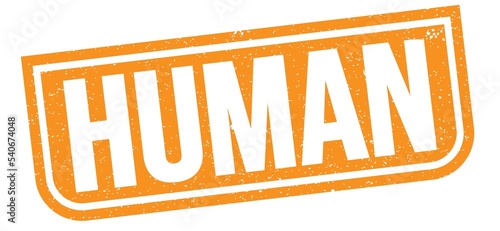 HUMAN text written on orange stamp sign.