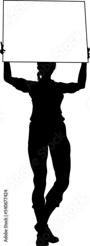 Protestor or demonstrator at a demonstration march, picket line or strike protest rally in silhouette. Holding up a banner or picket sign board placard.