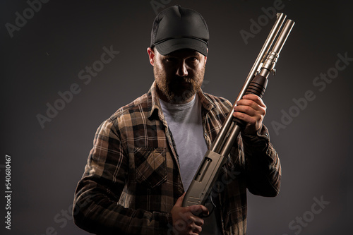 White man with shotgun rifle.