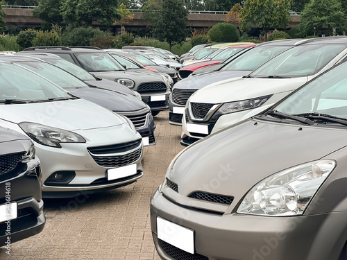 View of many different cars in parking lot