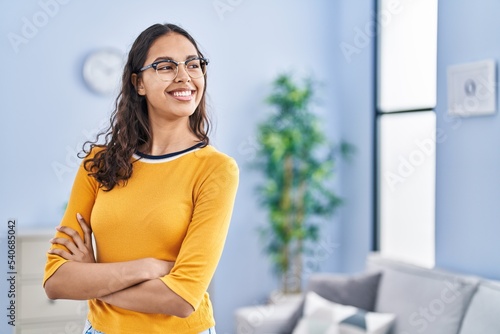 Young african american woman smiling confident standing with arms crossed gesture at home Free Download Young african american woman smiling confident standing with arms crossed gesture at home - GFXLoad