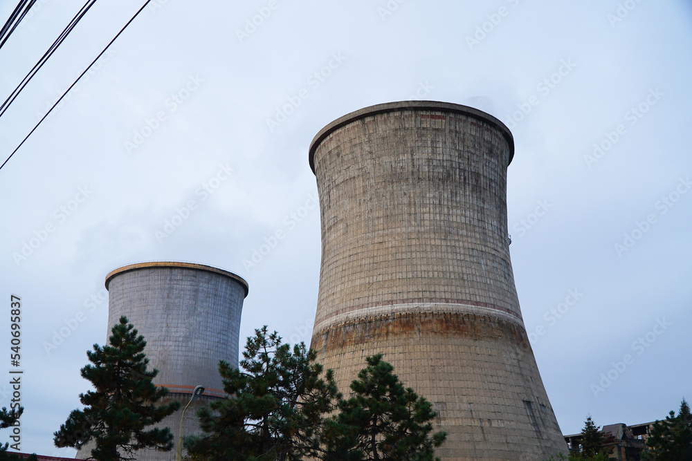 The chimney of a thermal power plant, the smoke extracted by a thermal power plant on the chimney, in the production process. Environment. Pollution. The chimney of a thermal power plant, the smoke extracted by a thermal power plant on the chimney, in the production process. Environment. Pollution.