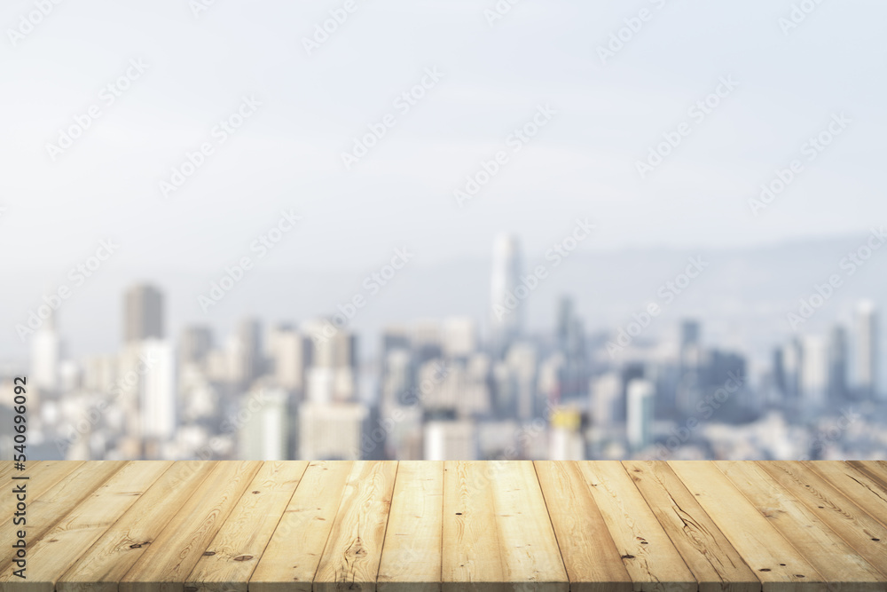Table top made of wooden dies with beautiful blurry cityscape on background, mockup