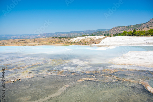 Calcite cliff of Pamukkale, white travertines in Turkey