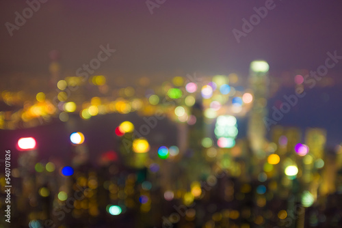 Abstract blurred Hongkong city building at night with victoria river © themorningglory