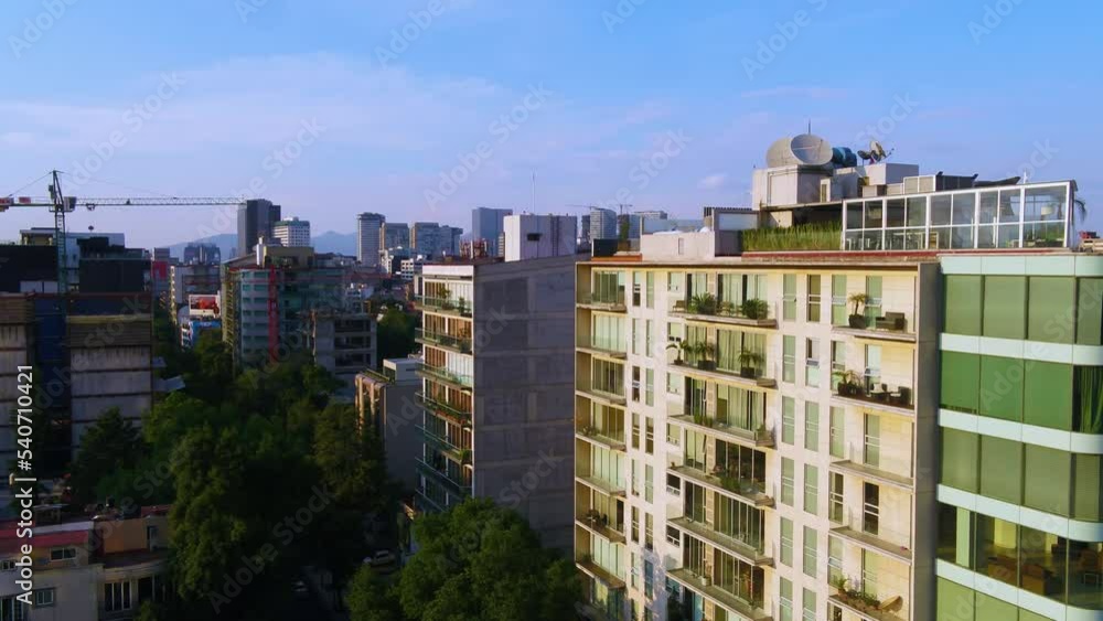 Aerial view around apartment buildings in Polanco sunny evening in Mexico city - circling, drone shot Aerial view around apartment buildings in Polanco sunny evening in Mexico city - circling, drone shot