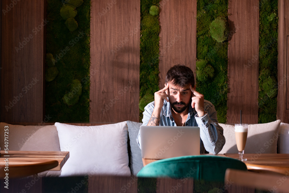 Freelance men drinking coffee and using mobile Freelance men drinking coffee and using mobile